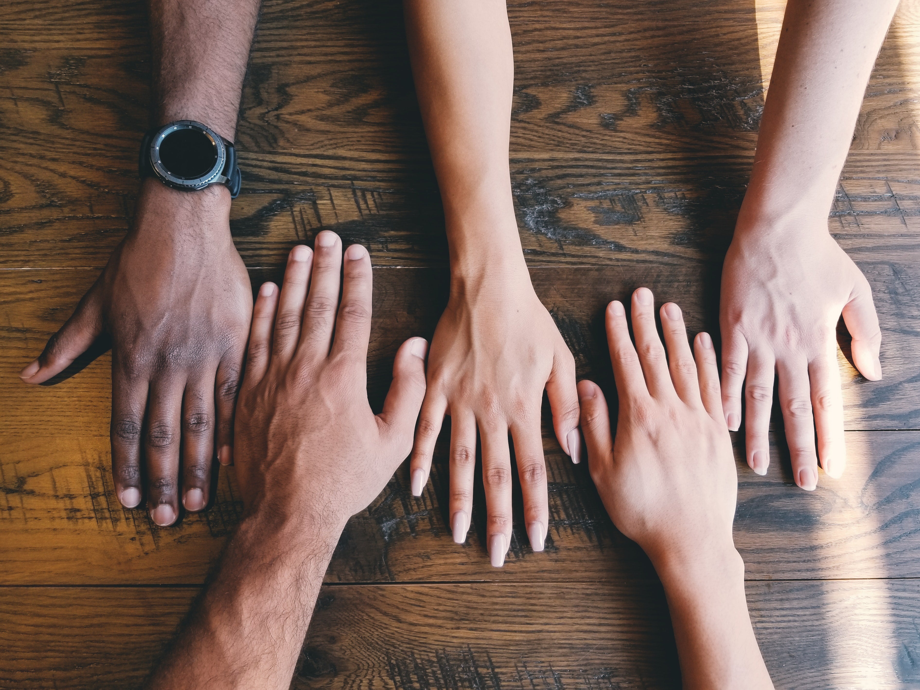 hands on a table community