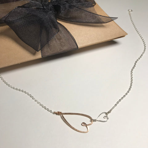 Beth Jewelry 2 Heart Necklace in mixed metals with brown giftbox with black ribbon