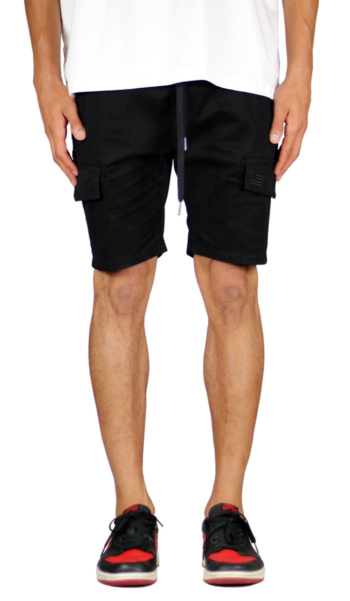 man wearing black cargo shorts