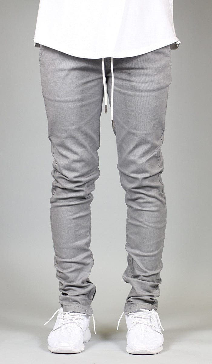 grey jeans with zippers