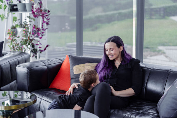 Petra with her son, at home