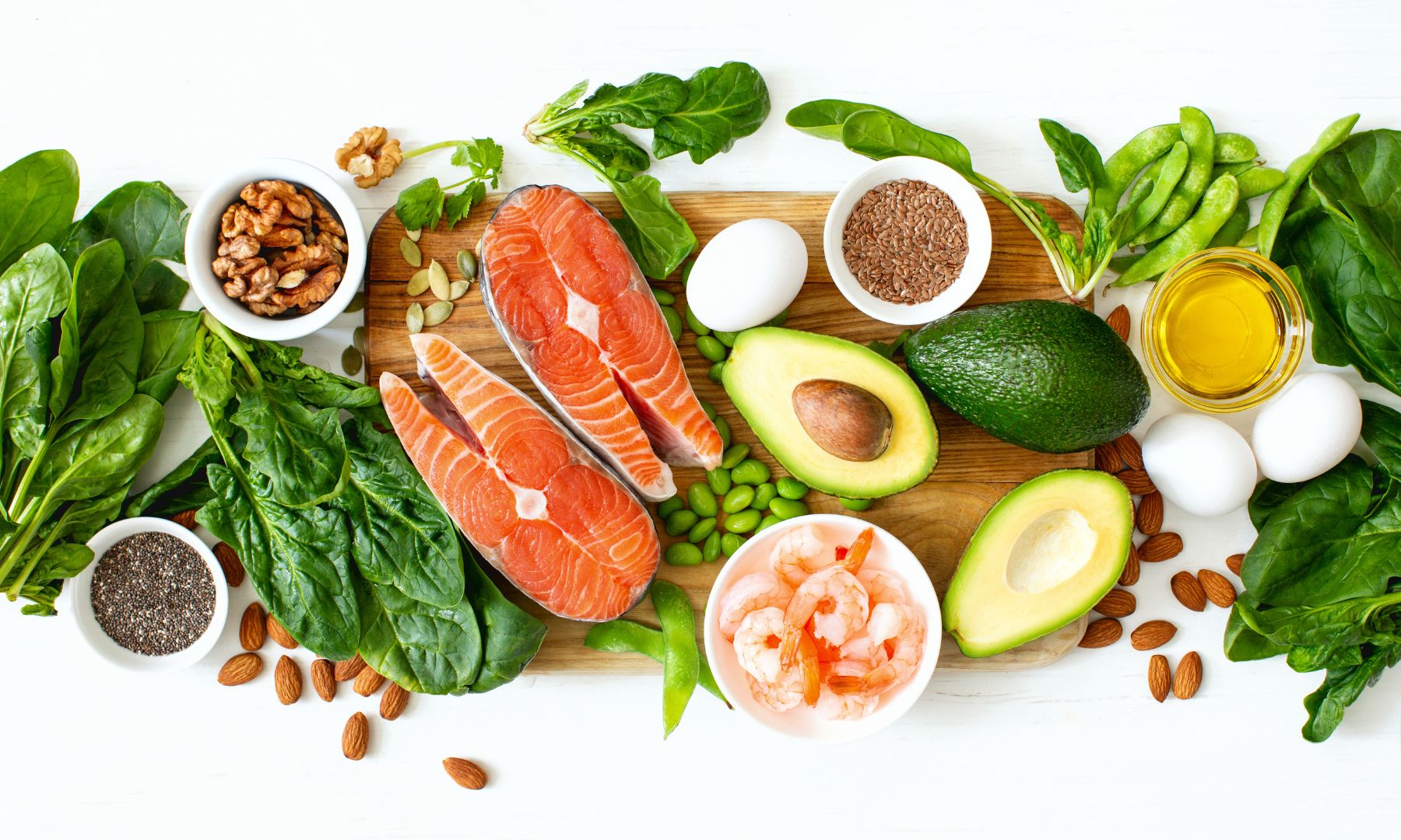 Foods high in omega-3 including salmon, avocado and prawns