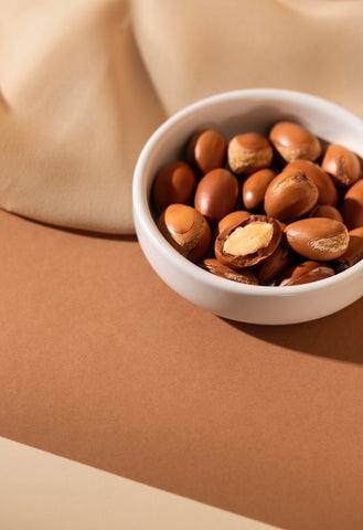 argan seeds in a plate on a table