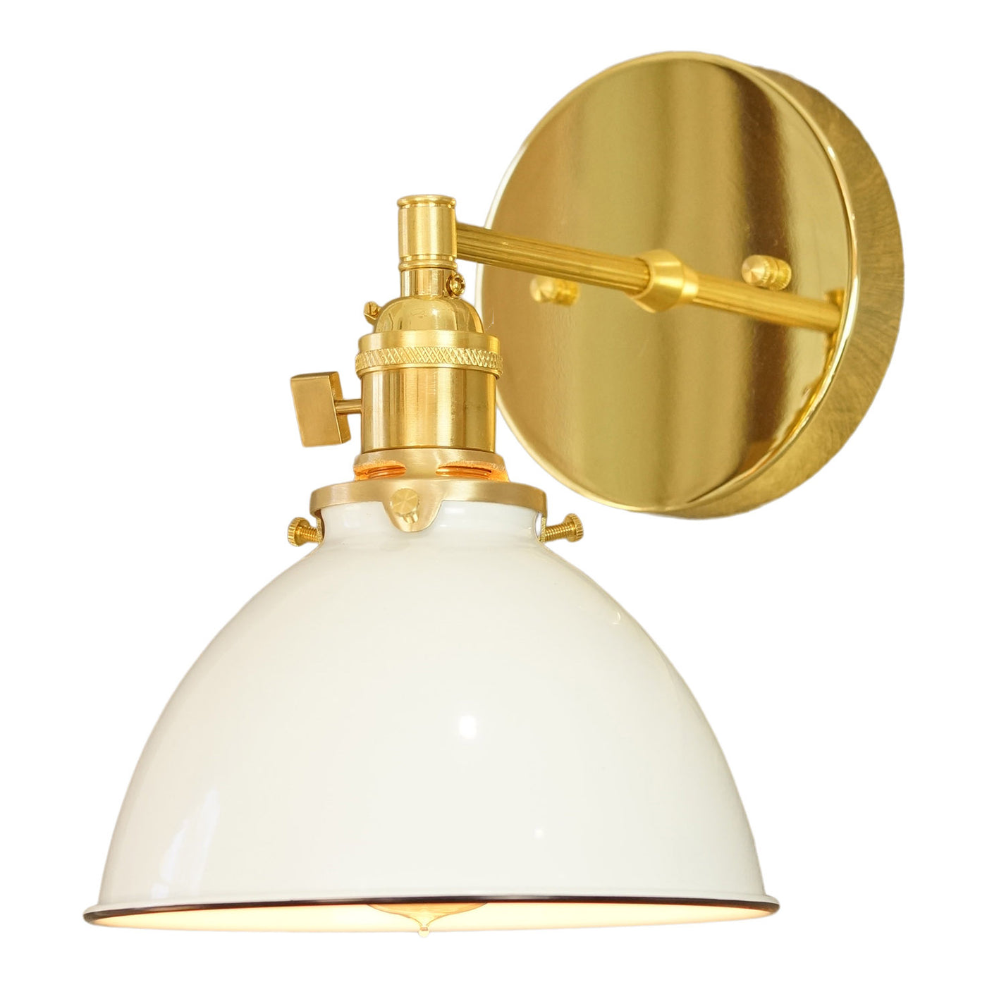 white and brass wall sconce