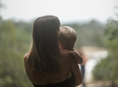 Image of mother holding a baby.