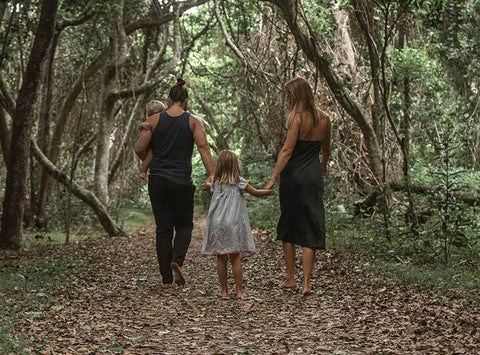Image of Mason, Tahnee, Aiya and Leo walking through the bush