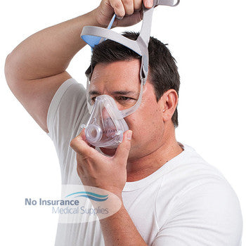 man with CPAP mask