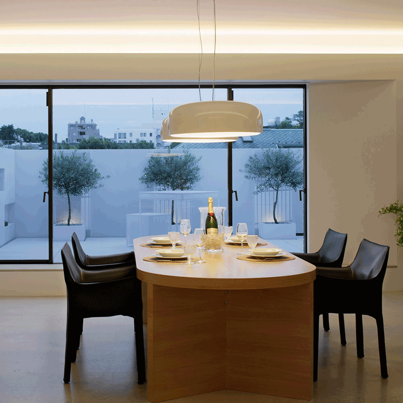 Flos Smithfield suspension great as task light but also dimmable for ambient ligth above dining table