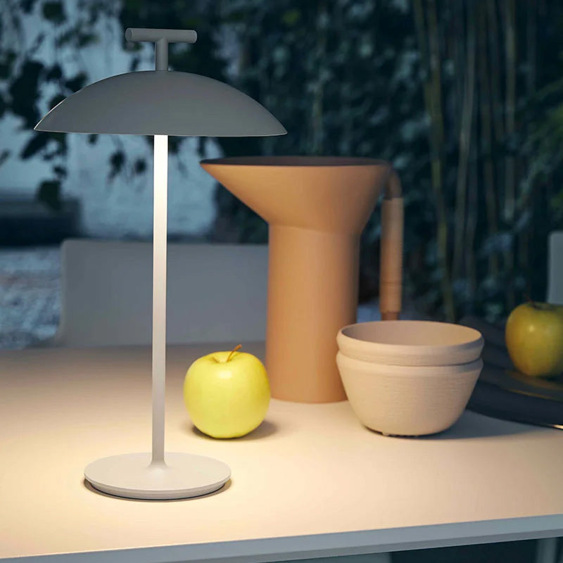 Kartell Mini Geen-A dimmable and rechargeable table lamp for outdoor use