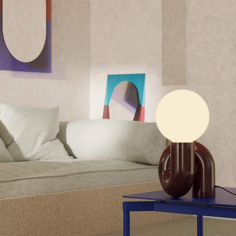Petite Friture Neotenic sculptural table lamp with interesting and playful curves