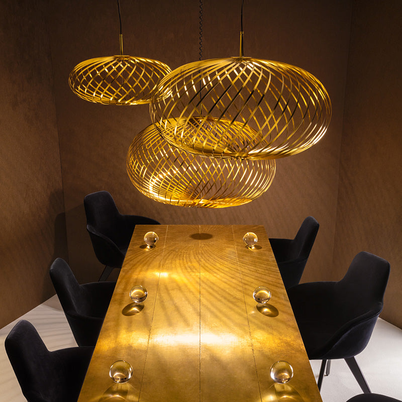 Tom Dixon Spring pendants nice eye-catcher alone, magical effect when hung in cluster