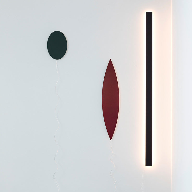 Valerie Objects Tramonto geometrical wall lamps emitting soft light from behind