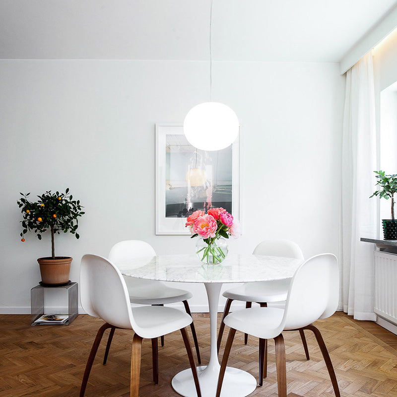 Flos Glo-Ball pendant soothing light above dining table