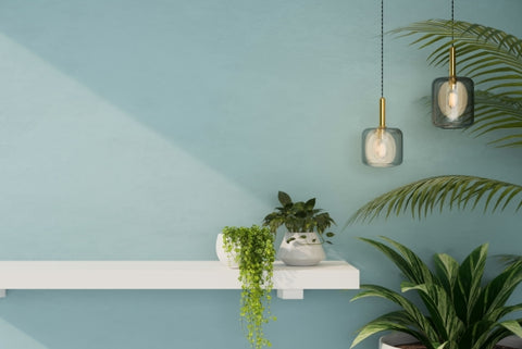copy-space-modern-white-wall-shelf-with-decor-minimal-plants-stylish-blue-wall