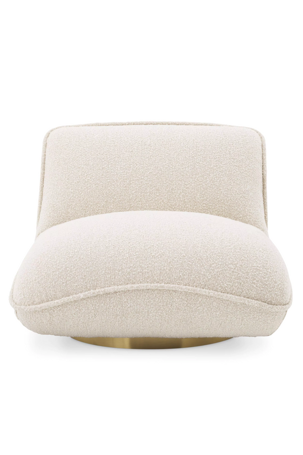 Fabulous Home - A spotlight on the elegant curves of our Brice chair, set  on a brass swivel base for endlessly smooth movement. Our matching round  Palla pillows add a touch of