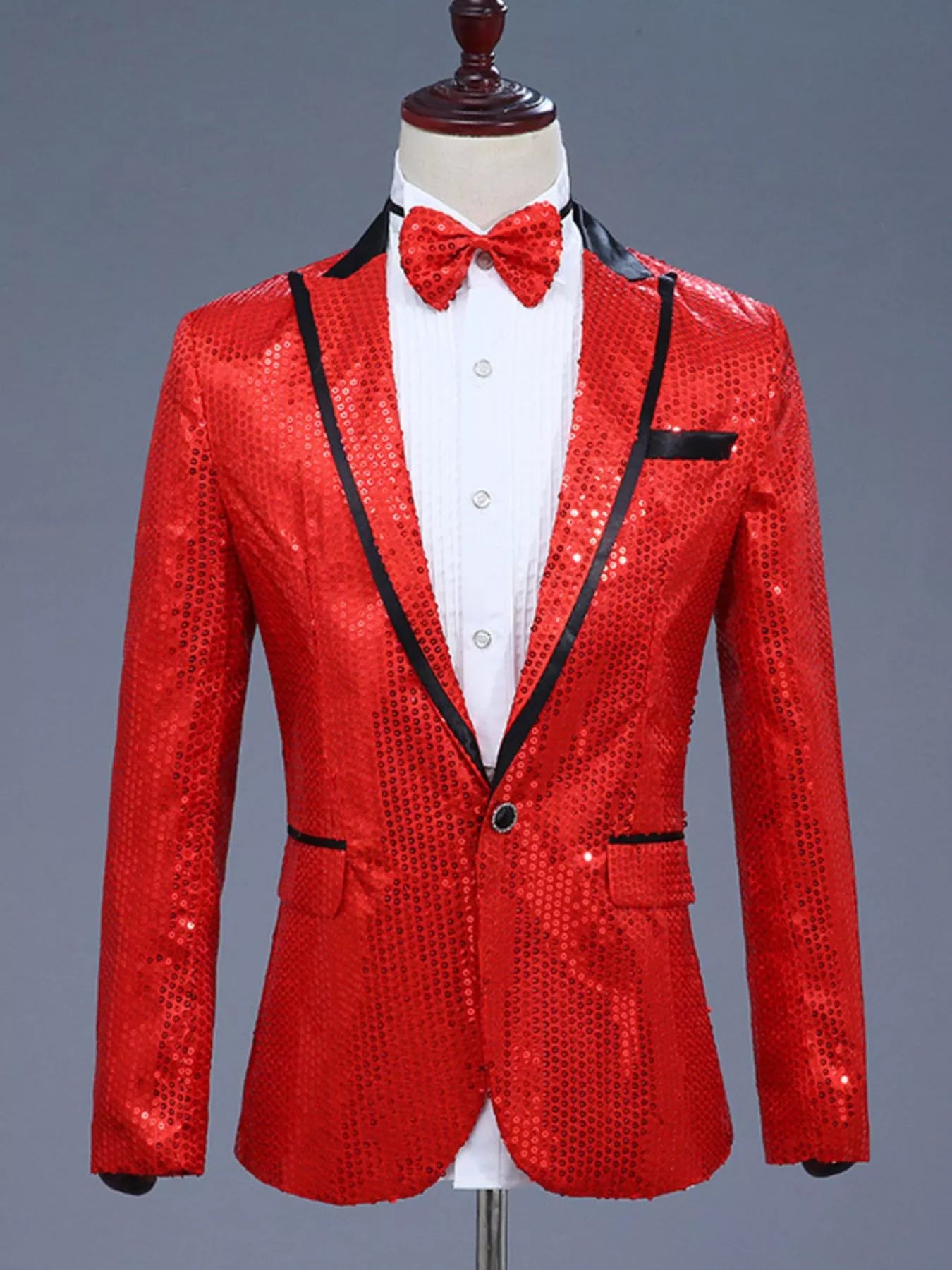 Pink sequin blazer with black collar and trim - front view