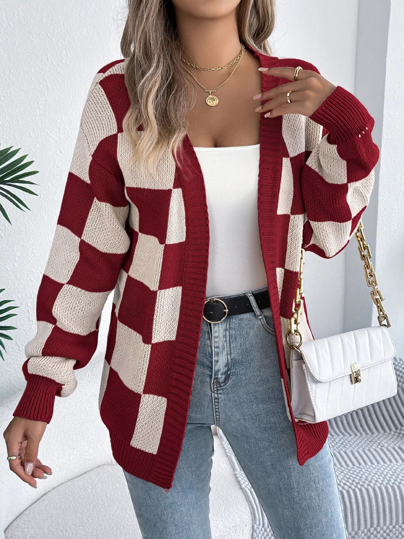 Black checkered cardigan styled for casual fall wear