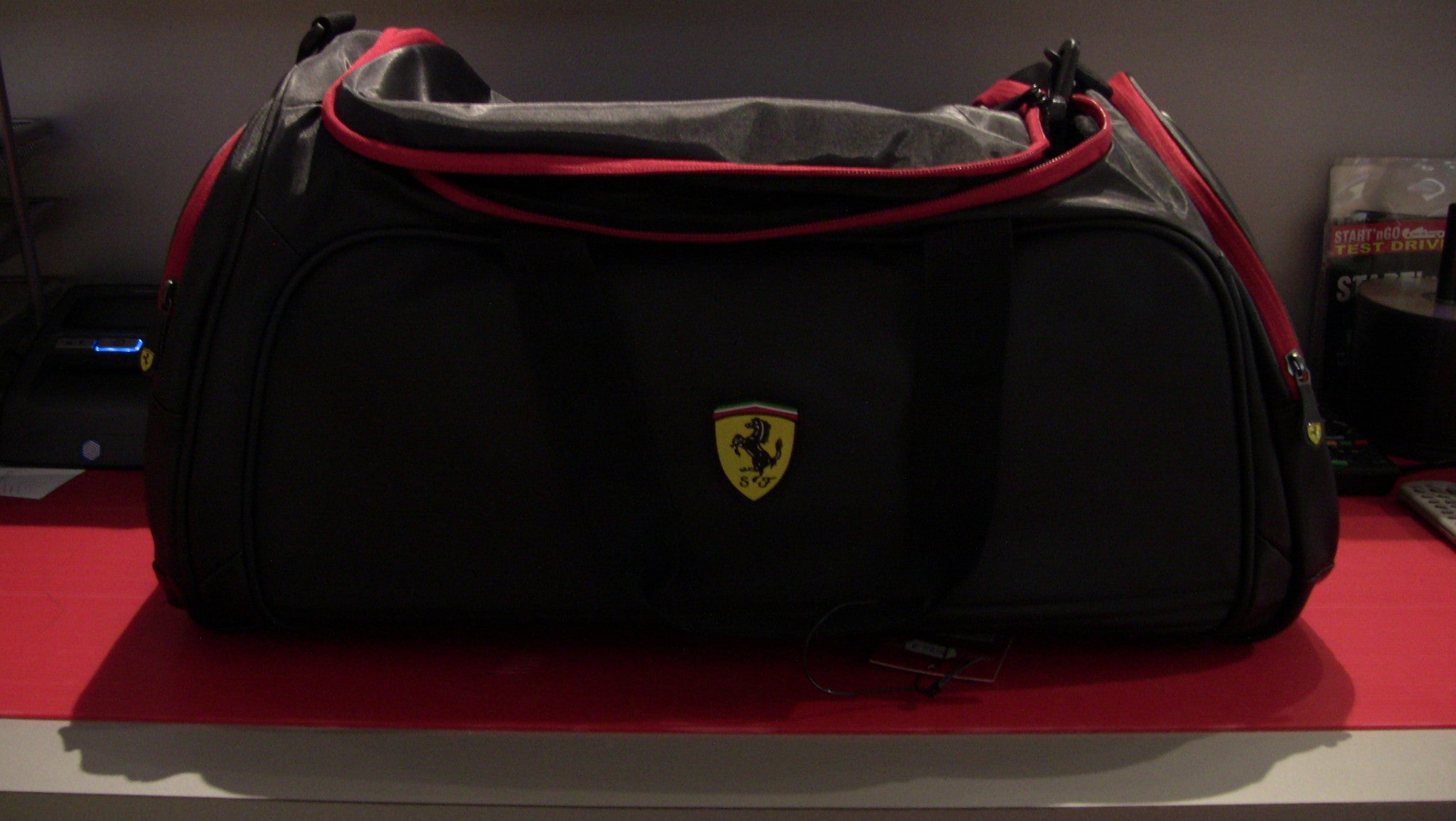 red ferrari bag