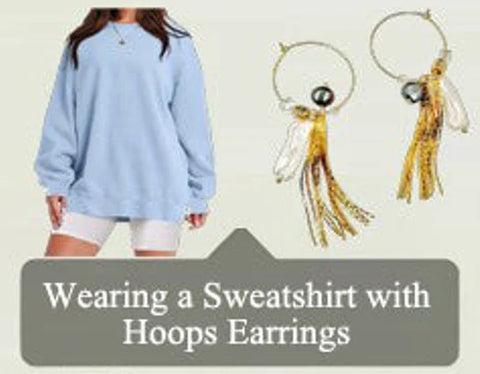 wearing_a_sweatshirt_with_hoops_earrings