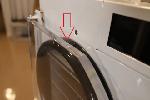 Pour the soapy water a little at a time at the top center of where your door and gasket meet.