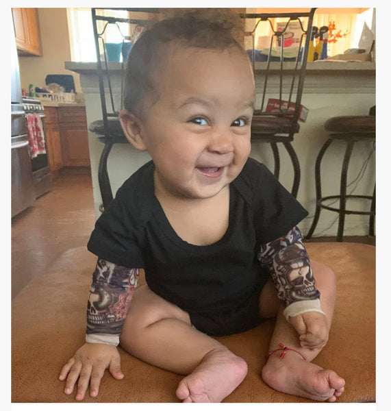 These Adorable Tiny tattoo Onesies Make Babies Look Like Rock Stars