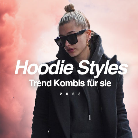 Hailey Bieber in schwarzem Hoodie Blazer Sonnenbrille Streetwear 2023 Trends