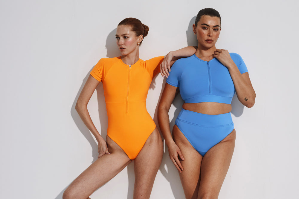 Models in Knix Swimwear display: full