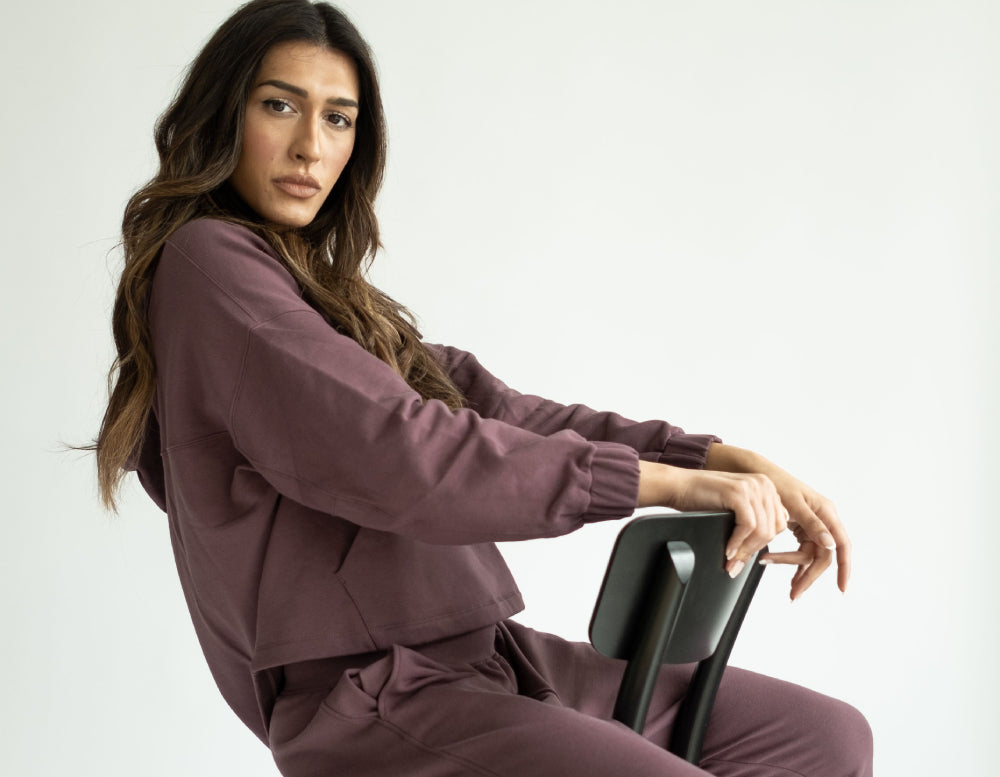 Jordan wearing the Good to Go Fleece Oversized Hoodie and Jogger in Dahlia / Image by Tori Puras display: full