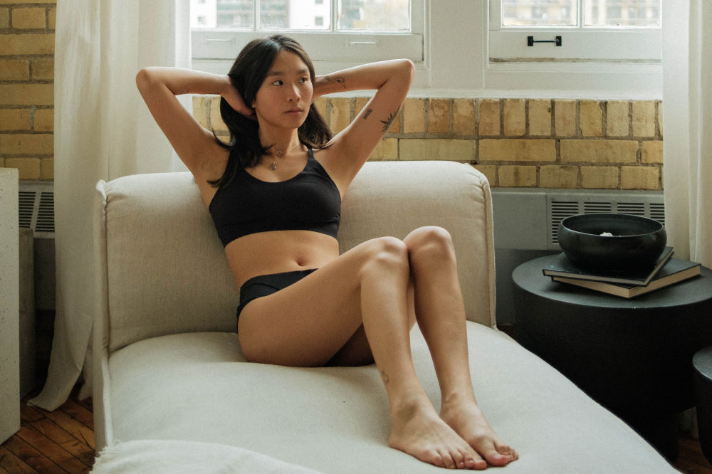 Photographer Jasmin Chew in the Knixy Lace Racerback Bralette and Essential Boyshort display: full