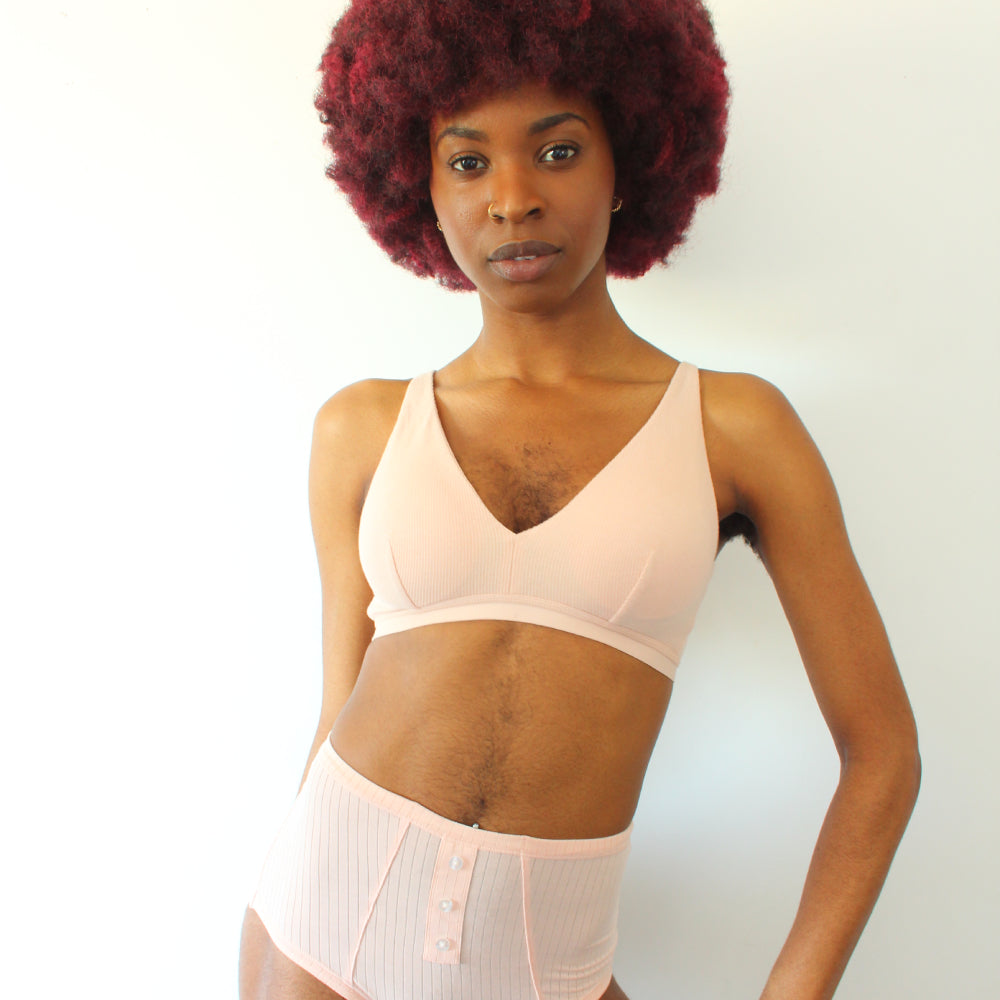 Queen Esie wearing the Micro Modal Rib Bralette and Micro Modal High Rise Underwear in Peony from the Ashley Graham x Knix Collection display: full