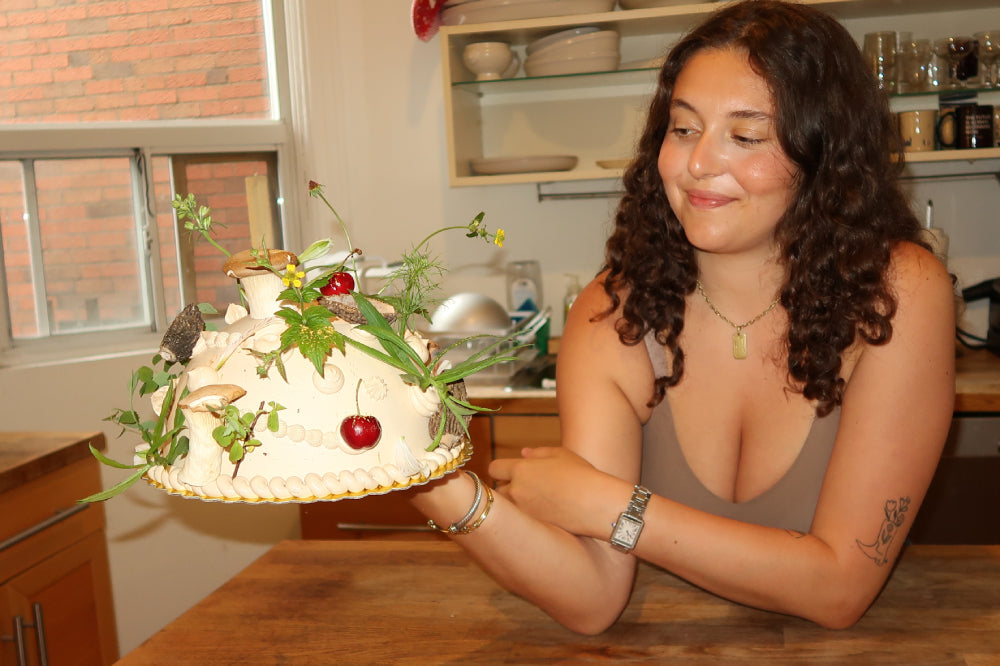 Julia wearing the LuxeLift Bodysuit in Mushroom display: full