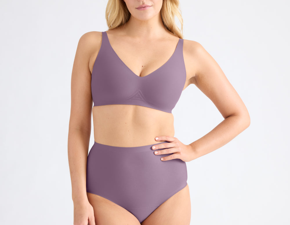 Knix model wearing Super Leakproof No-Show High Rise underwear in Plum display: full