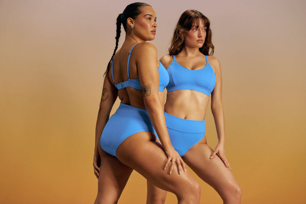 Knix models wearing the Leakproof High Rise High Cut high waisted swim bottoms in Oceana display: full
