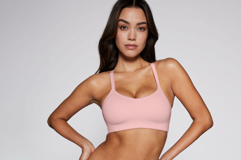 Knix model wearing the One&Only Scoop Bra in Rose Water display: full