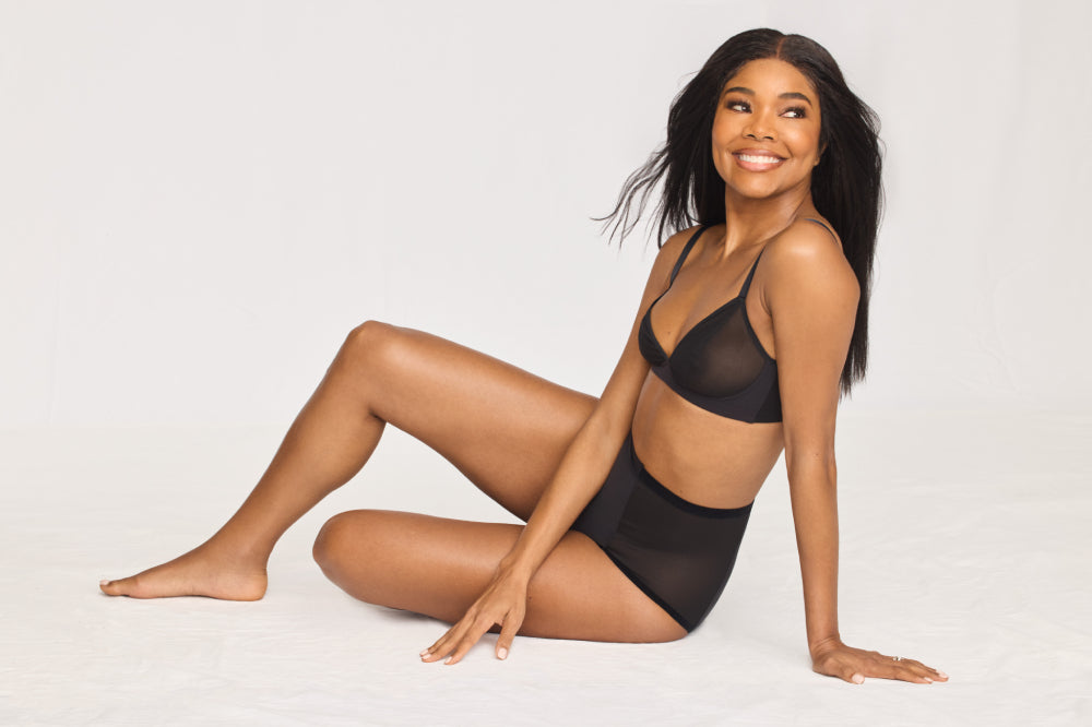 Gabrielle Union wearing the Mesh Deep V Bra and Light Leakproof No-Show Mesh High Rise in Black display: full