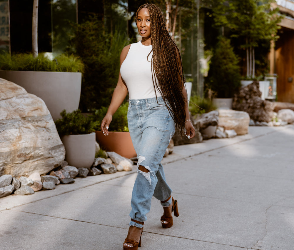 Shannae dishing some serious street-style in the Micro Modal Rib Bodysuit in Cloud and distressed denim display: full