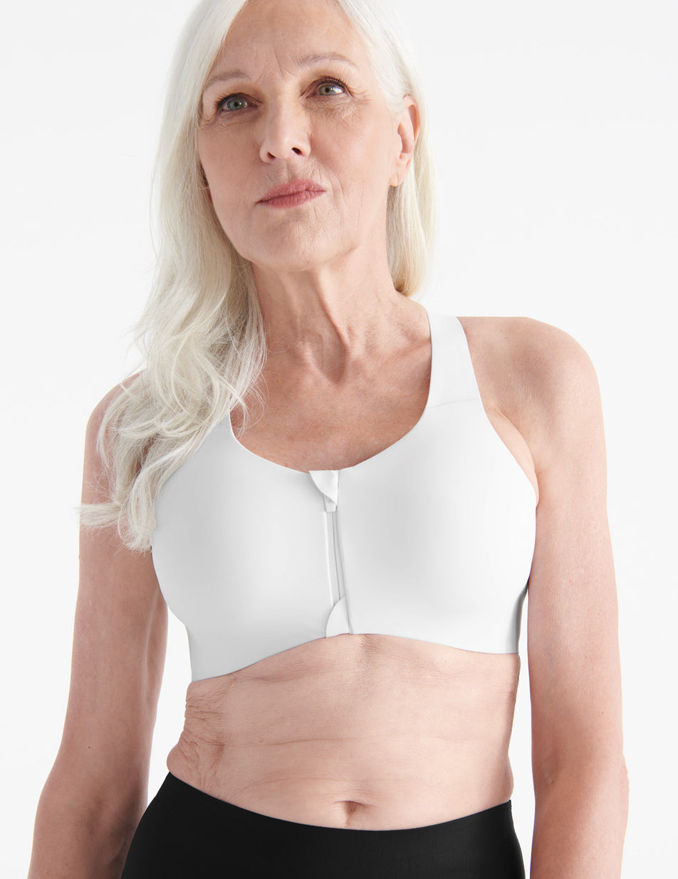 A sport bra with a mock neck and… a front like this? Idk how to