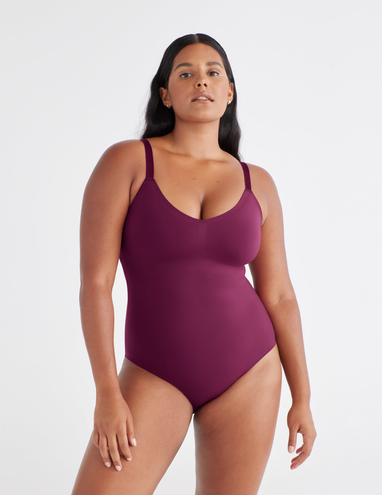 Adiya is a 36D and has 42" hips and wears a Knix size L 