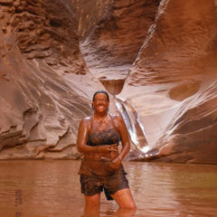 Lisa in a mud treatment Colorado river in the Grand Canyon 2017