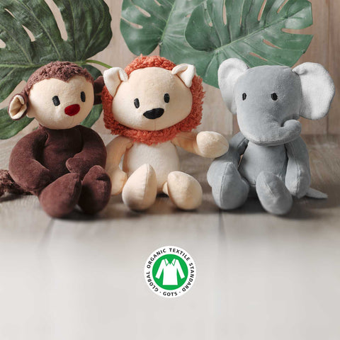 three Bears for Humanity stuffed animals sit together on a shelf