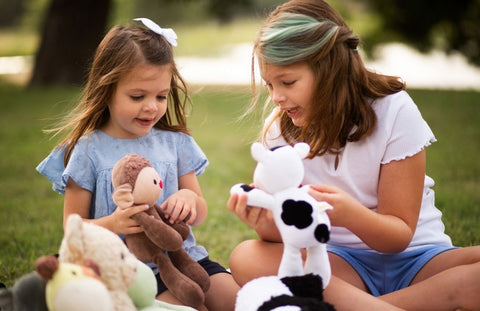 Sisters Play with Bears for Humanity Plushies