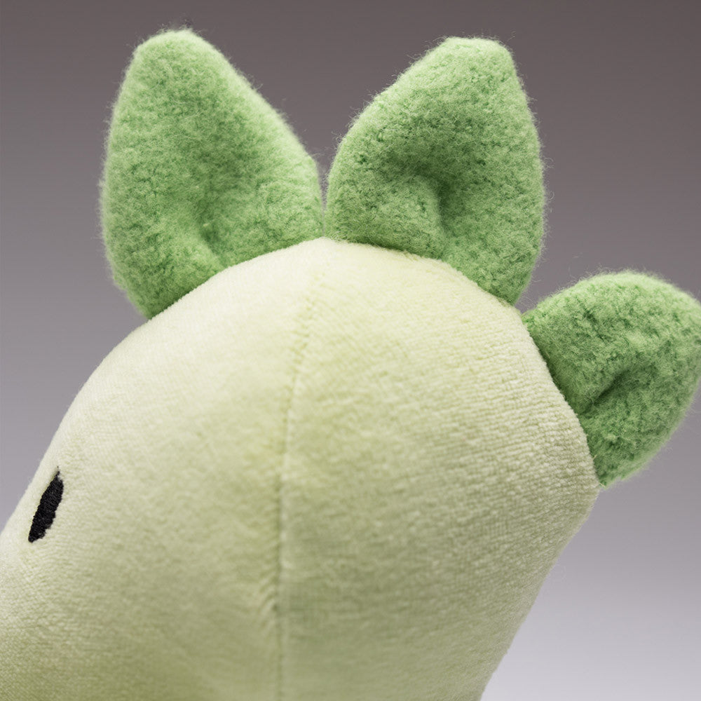 green plush dinosaur