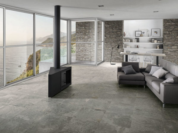 NuSlate 24x24 Porcelain Tile in Silver featured in modern living room with open floor plan 