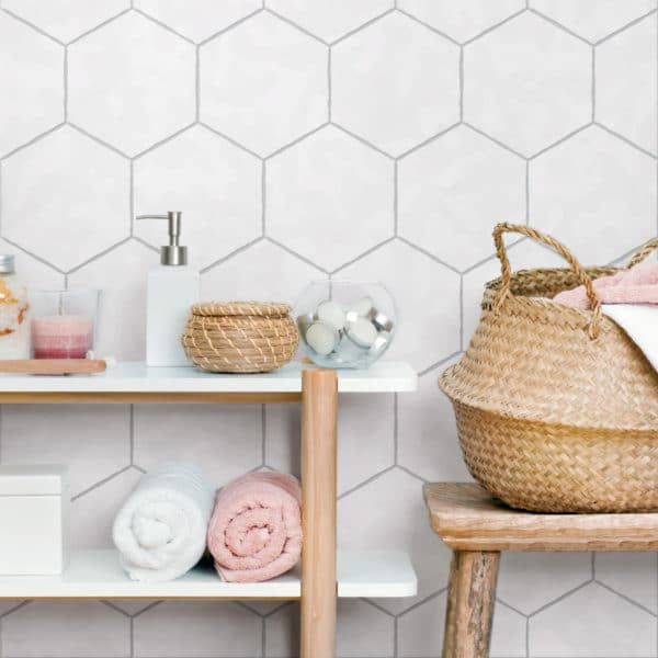 Palm Hex 6x7 Glazed Porcelain Tile in White featured in bathroom wall