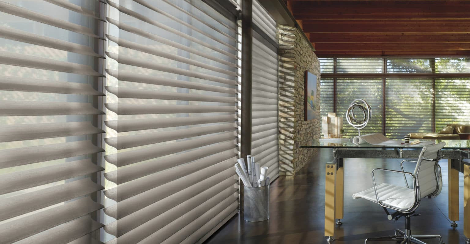 Hunter Douglas Commercial Silhouette Window Shadings in Office Room