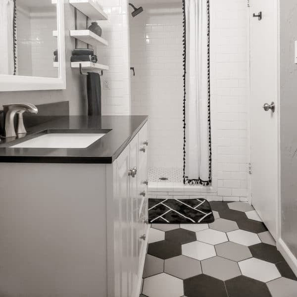 Mod Hex Matte Porcelain Tile in Black in bathroom