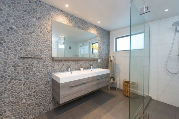 Perfect Pebble 12x12 Natural Stone in Alpine bathroom accent wall 