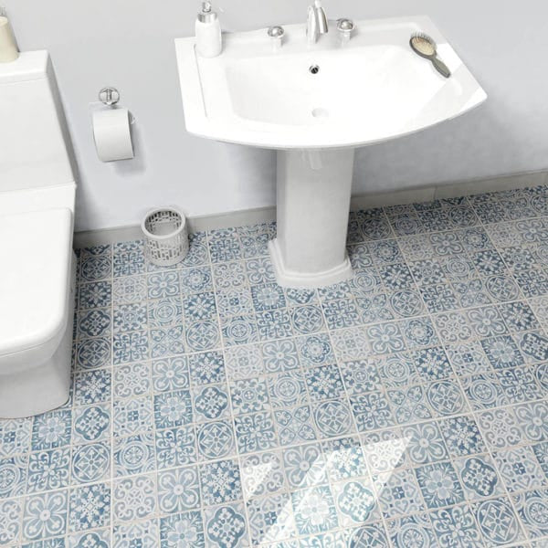 Faenza 13x13 Patterned Tile in Azul featured in a bathroom floor 