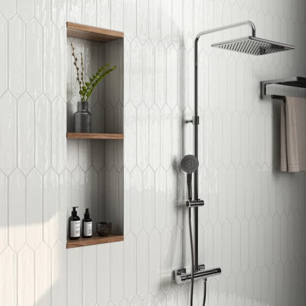 Watercolor 3x12 Picket Glazed Ceramic Tile in White featured in shower