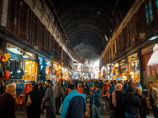 vibrant market in damascus with people walking everywhere